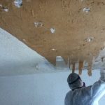 Mold remediation crew removing ceiling